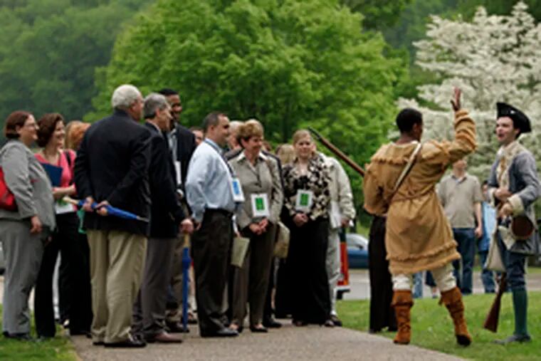 Actors Joseph Nevin and Keith Henley (left), part of the Once Upon a Nation program, bring a pair of enlisted men to life as they lead a tour of Washington&#0039;s headquarters at Valley Forge National Historical Park.