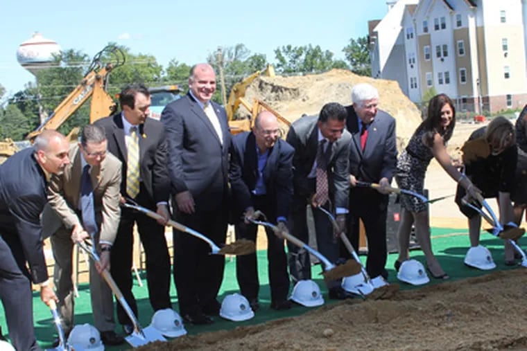 Dignitaries break ground on Rowan Boulevard’s second mixed-use building and parking garage. (Handout photo)