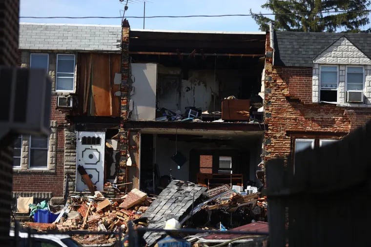 Emergency workers on the scene of a house explosion on Algard Street in Northeast Philadelphia.