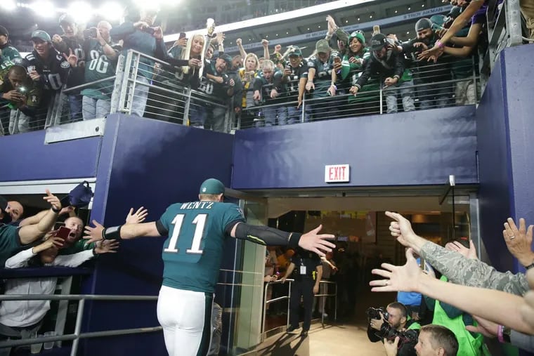Eagles’ Carson Wentz flies off the field after the Philadelphia Eagles win 37-9 over the Dallas Cowboys in Arlington, Texas on November 19, 2017. DAVID MAIALETTI / Staff Photographer