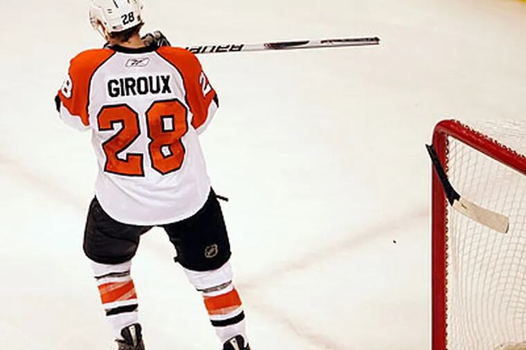 Claude Giroux slammed his stick in disgust after the Flyers lost Game 2 to the Bruins. (Yong Kim/Staff Photographer)