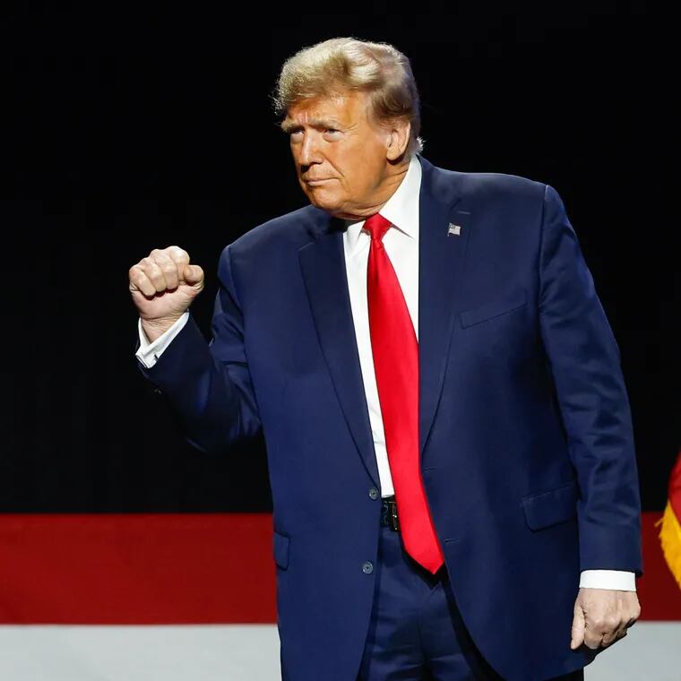 Former President Donald Trump takes the stage at the National Rifle Association's Presidential Forum in Harrisburg on Feb. 9. A new poll from The Inquirer, New York Times, and Siena College shows Pennsylvania voters favor Trump over President Joe Biden on crime.