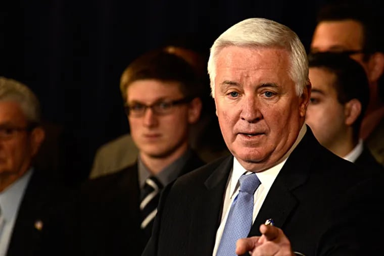 Gov. Corbett speaks at a news conference in State College where he explained the federal lawsuit he filed against the NCAA. The sanctions over the Jerry Sandusky case went beyond the scope of the organization, he argued. RALPH WILSON / Associated Press
