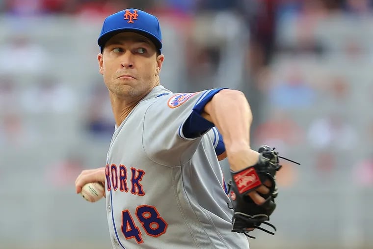 During his tenure with the New York Mets, Jacob deGrom compiled a microscopic 1.02 ERA in nine season debuts, giving up just six runs in 52 2/3 innings. DeGrom will make his Texas Rangers debut Thursday afternoon against the Philadelphia Phillies. (Photo by Kevin C. Cox/Getty Images)