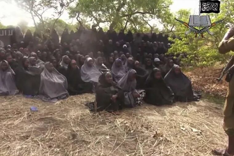 Some of the abducted girls appear in the video released by Nigeria's Boko Haram terrorist network, wearing gray Muslim veils.