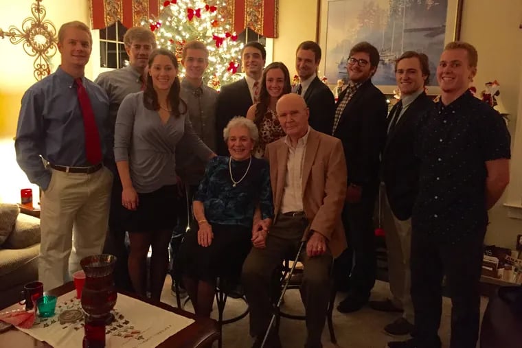 Dr. Lawrence with his wife, Mary, and 10 of his eleven grandchildren. Born and raised in Mount Airy, Dr. Lawrence was valedictorian of the Class of 1938 at Germantown High School.