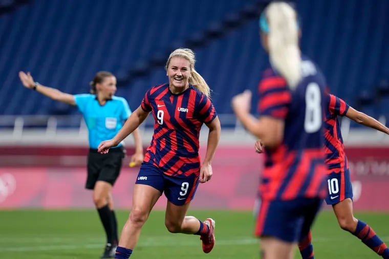 Lindsey Horan (9) celebrates after scoring the United States' second goal against New Zealand.