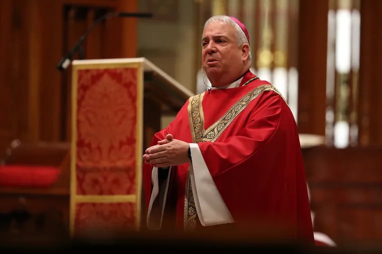 Archbishop Nelson Pérez gives his homily during Palm Sunday mass that was closed to the public at Cathedral Basilica of Saints Peter & Paul in Philadelphia, PA on April 5, 2020. The Cathedral Basilica of Saints Peter & Paul was closed to the public to help stop the spread of the corona virus.