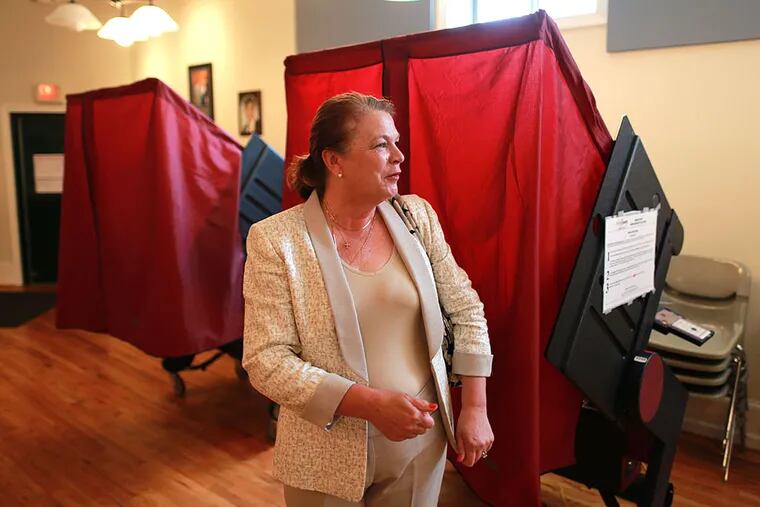 Claire Gustafson, who's running in the First Congressional District Republican primary, prepares to vote at Blessed Teresa of Calcutta Parish in Collingswood on Tuesday.