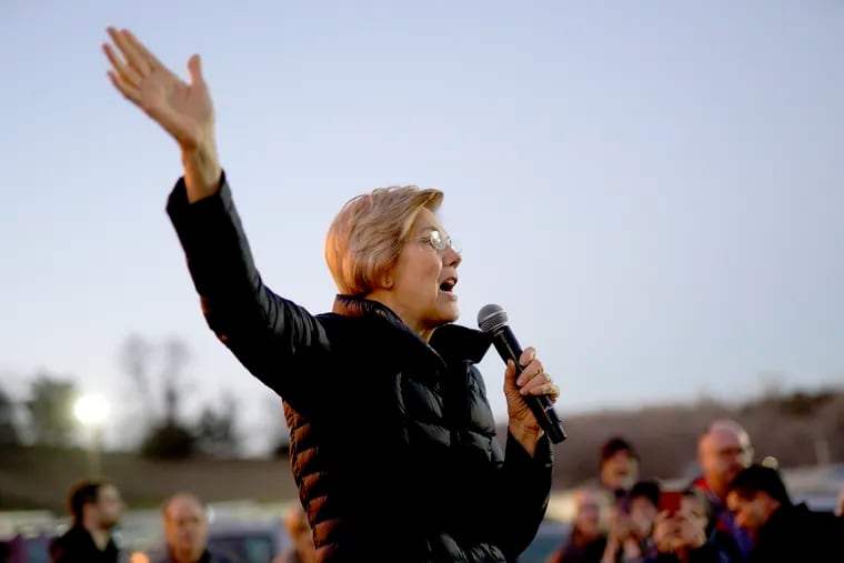 Sen. Elizabeth Warren, D-Mass, addresses an overflow crowd outside an organizing event at McCoy's Bar Patio and Grill in Council Bluffs, Iowa. Warren made her first visit to Iowa on January 4, 2019, testing how her brand of fiery liberalism played in the nation's premier caucus state. The 2020 Iowa Caucus is on February  3, 2020.