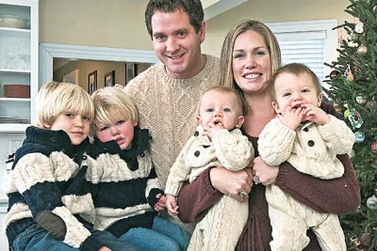 The Rodowicz family from left -Tyler,5; Owen,3 ; Bob, Nicole, and twin sons Kellan and Eagan. (Akira Suwa / Staff Photographer)
