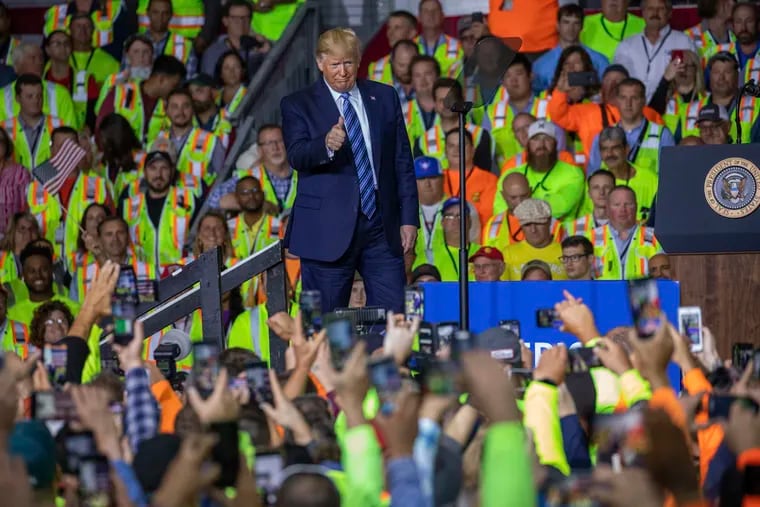 President Donald Trump walks on stage before speaking to a crowd of construction workers before touring Royal Dutch Shell's petrochemical cracker plant on Tuesday, Aug. 13, 2019 in Monaca, Pa. (Andrew Rush/Post-Gazette via AP)