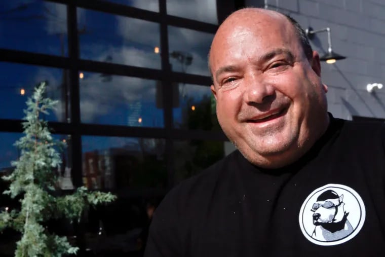 Reputed former mob executioner Philip Narducci smiles outside his restaurant, Chick's, on Washington Avenue in Philadelphia in July 2017.