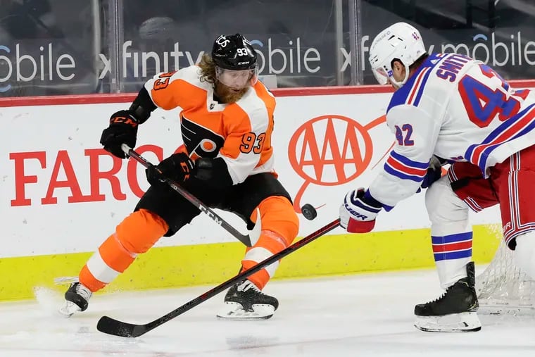 Flyers right winger Jake Voracek (left) has been the team's best road performer this season, collecting 18 points in 17 games.