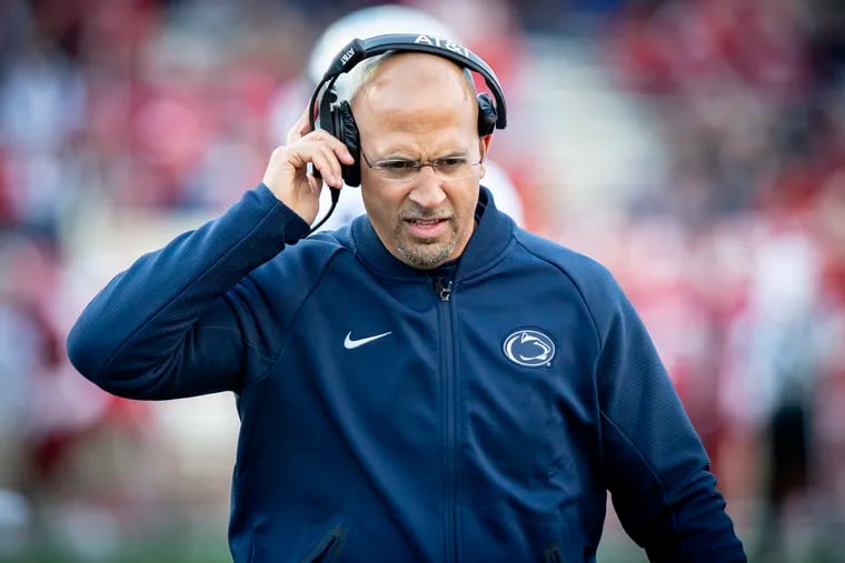 Penn State head coach James Franklin listens to his headphone during the second half of an NCAA college football game Saturday, Oct. 20, 2018, in Bloomington, Ind. Penn State won 33-28.
