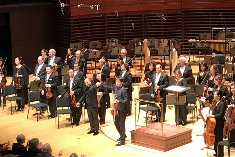 Yannick Nezet-Seguin (left) and Joshua Bell (right) at his Thursday night concert with the Philadelphia Orchestra
