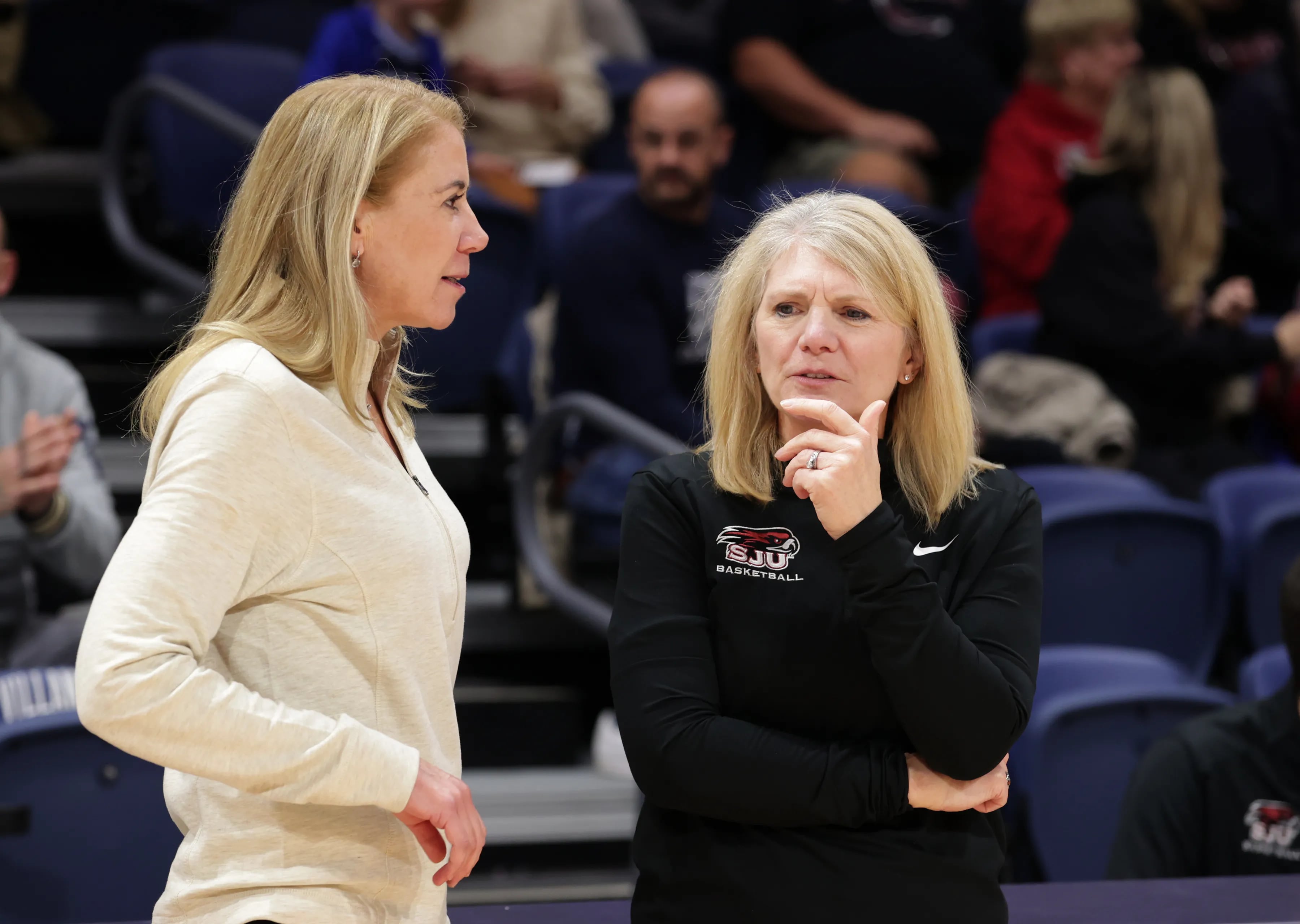 Villanova coach Denise Dillon (left) and St. Joe's coach Cindy Griffin are coaching their alma maters.
