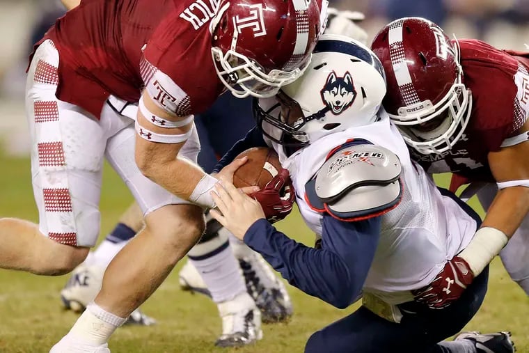 Temple's Tyler Matakevich, in action against UConn, is a consensus first-team all-American. &quot;He's been challenged the whole way and he's never been upset about it,&quot; Temple coach Matt Rhule said of his star player.