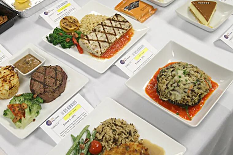 A presentation of new menus for US Airways passengers. LSG Sky Chefs, the catering group that prepares food for US Airways and other airlines, prepared nearly 500 million meals last year. CHARLES FOX / Staff Photographer
