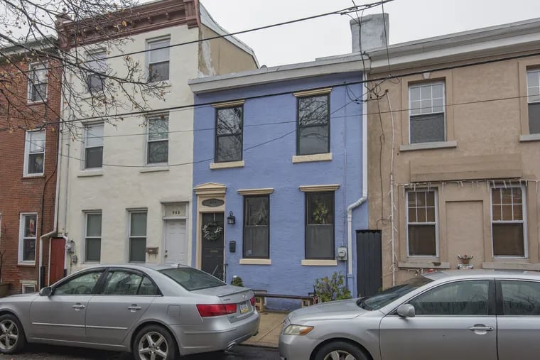 The blue two-bedroom, one-bathroom house is just east of Passyunk Square and the Italian Market and west of Pennsport and the Delaware riverfront along Columbus Boulevard.