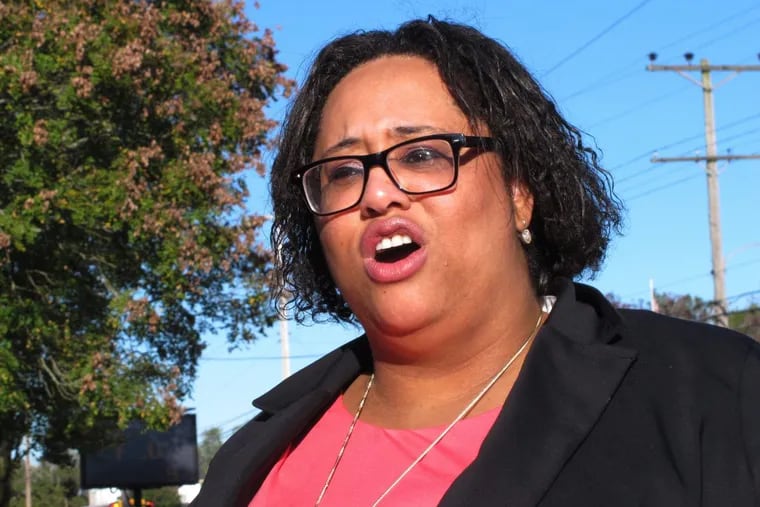 This Oct. 20, 2017 photo shows Ashley Bennett, a Democratic candidate for freeholder in Atlantic County, N.J. speaking about her campaign in Northfield, N.J. She decided to make her first run for public office after an incumbent Republican on the freeholder board posted a meme on social media asking whether participants in the Women's March on Washington would be home in time to cook dinner. (AP Photo/Wayne Parry)