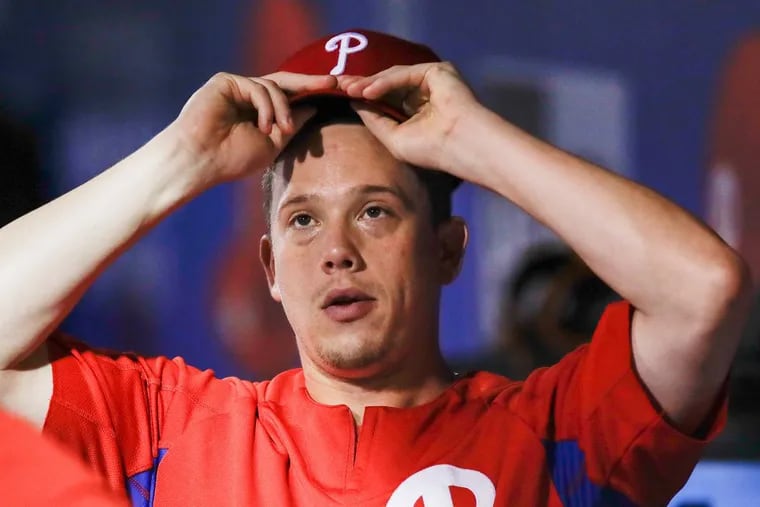 Phillies’ pitcher Jeremy Hellickson, seen here in the Phillies dugout on Friday, was involved in a car accident on his way to the airport.