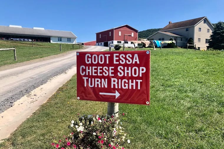 A sign directs customers to the cheesemaking facility and store at Goot Essa in Howard, Pa.