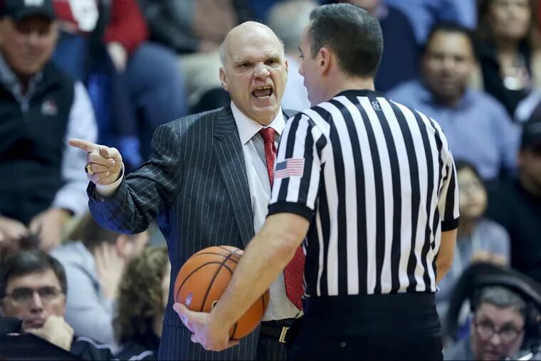 Saint Joseph's head coach Phil Martelli argues with an official during a game against La Salle at Hagan Arena on Saturday, March 3, 2018. Saint Joseph's won 78-70. TIM TAI / Staff Photographer
