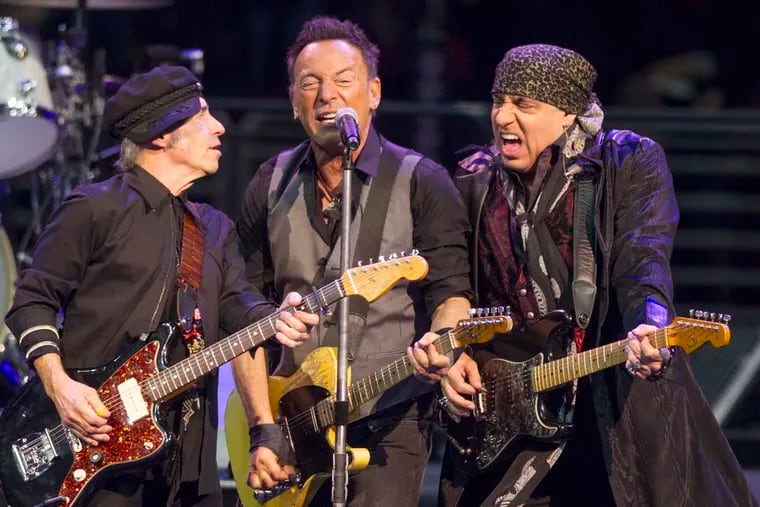 Bruce Springsteen & The E Street Band at the Wells Fargo Center in Philadelphia on Feb. 12, 2016.  L-R: Nils Lofgren, Bruce Springsteen and Steven Van Zandt come together in one of the first songs.  ( CHARLES FOX / Staff Photographer )