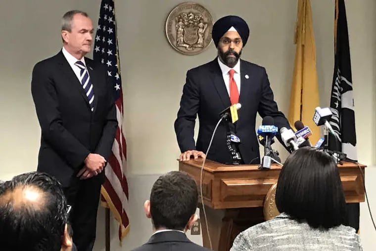 New Jersey Gov. Phil Murphy (left) and state Attorney General Gurbir Grewal (right).