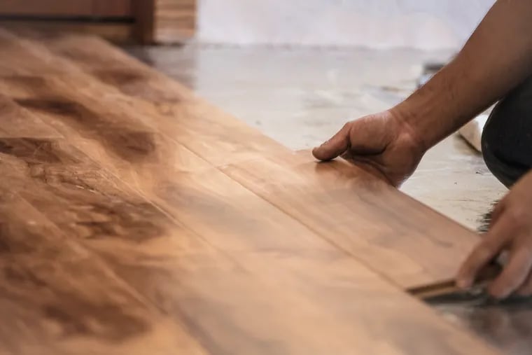 For the biggest impact from a $20,000 investment in your home, replace or refinish all the floors in your home, one expert says.