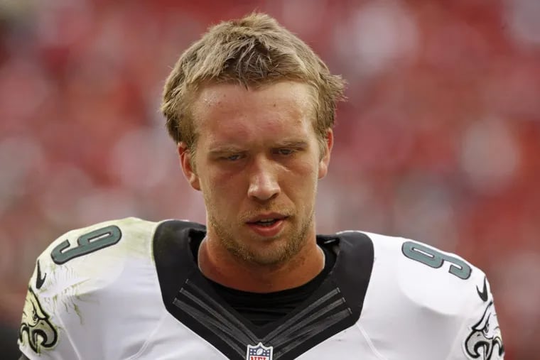 Nick Foles walks off the field after an Eagles loss to the 49ers back in Sept. 2014.
