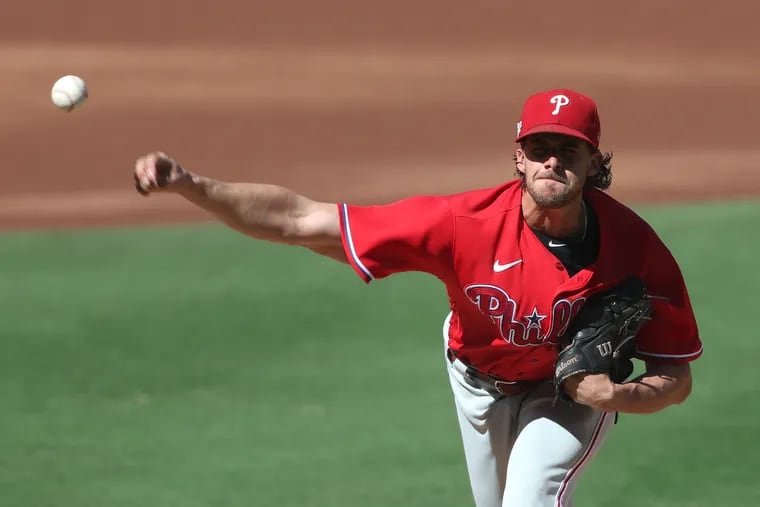 Philadelphia Phillies pitcher Aaron Nola delivers a pitch during a playoff game in San Diego last month. Nola is slated to start Game 4 of the World Series against the Houston Astros on Tuesday night at Citizens Bank Park. (Photo by Sean M. Haffey/Getty Images)