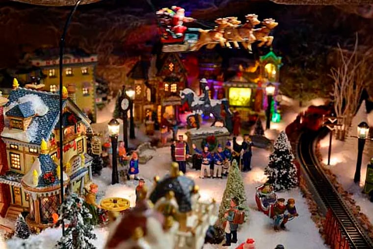 Detail of the indoor Christmas village in the living room of Rocco Martino and Mark Magaldi December 21, 2012. ( TOM GRALISH / Staff Photographer )