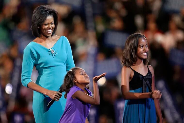 Michelle Obama with daughters Sasha, 7, and Malia, 10, at the Democratic Convention in August. The girls were an asset to the campaign, but may see less exposure as residents of the White House.