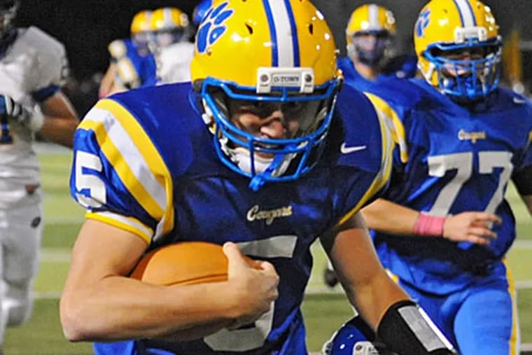 Downingtown East quarterback Kyle Lauletta passed for 182 yards and four touchdowns. (Clem Murray/Staff Photographer)