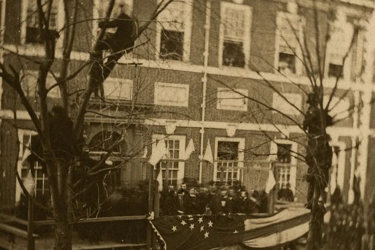 Less than two weeks before his 1861 inauguration, Abraham Lincoln (center) raised the flag in front of Independence Hall to mark Washington's Birthday.