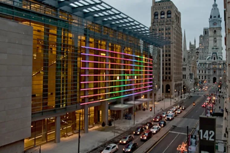 The Broad Street side of the expanded Convention Center offers LED lighting and vast expanses of glass to showcase the cityscape. (David M Warren / Staff Photographer)