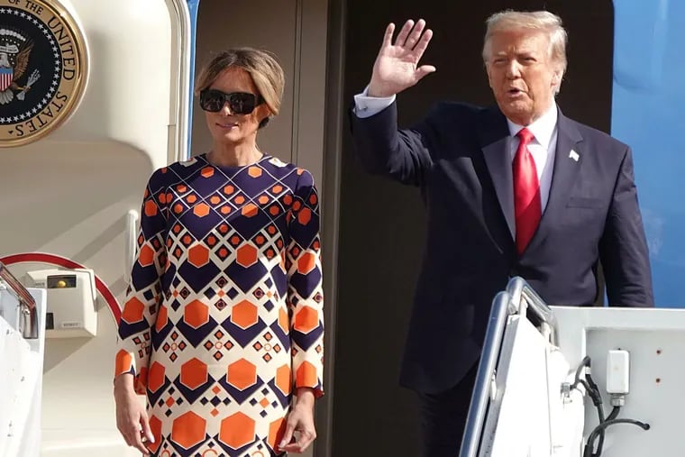 Melania Trump and former President Donald Trump arrive at Palm Beach International Airport in West Palm Beach an hour before he left office on Jan 20, 2021.