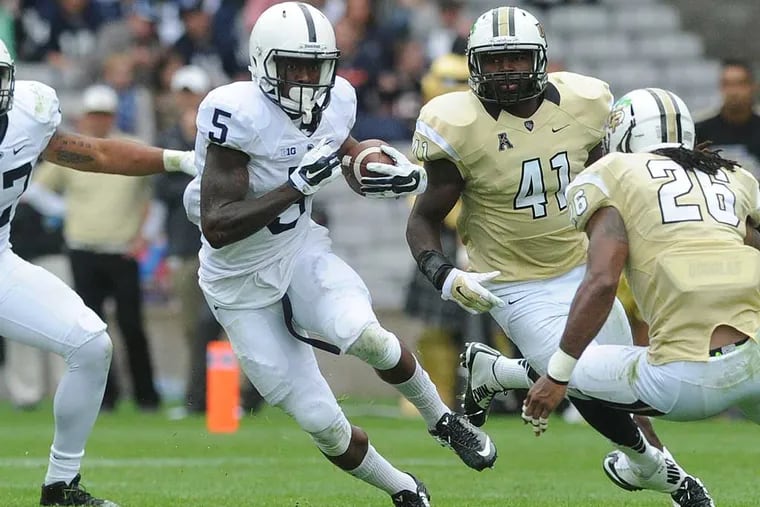 Penn State's DaeSean Hamilton tries to cut past Central Florida's Clayton Geathers during an NCAA college football  at Croke Park Stadium on Saturday, Aug. 30, 2014, in Dublin, Ireland. AP Photo/York Daily Record, Jason Plotkin)  YORK DISPATCH OUT