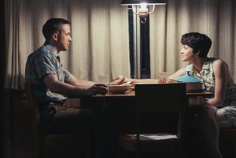 Ryan Gosling, left, and Claire Foy in a scene from 'First Man.'