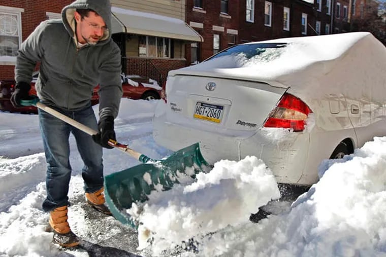 Daniel Potoczniak digs his car out on Ellsworth Street in South Philadelphia. The mountainous, blackening snow piles, record power outages, winter-strafed roadbeds, and legions of defeated trees.
All argue for the singular ferocity of the winter of 2013-14.