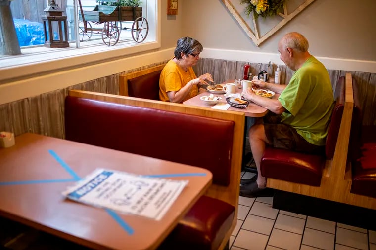 Maureen Lemanski and Greg Lemanski, of Toms River, N.J., are eating indoors at Lakeside Diner in Lacey Township, N.J., on Tuesday, Sept., 1, 2020. “As soon as we found out he was opening we wanted to support him,” Greg said. “I’ve been to other states and is easily done when you social distance. We’re adults, we can decide for ourselves.”