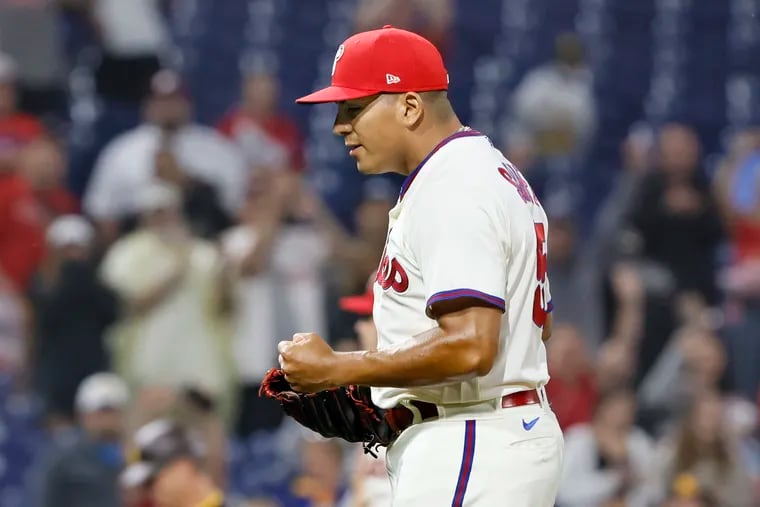 Ranger Suarez pumps his fist after recording his first major-league save in the Phillies' 4-2 victory over the Padres on Saturday night at Citizens Bank Park.