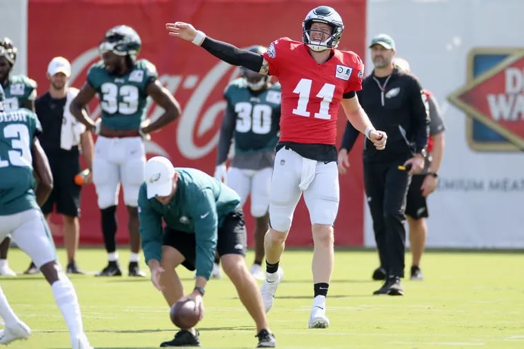 Quarterback Carson Wentz calls a play during Eagles training camp at the NovaCare Complex in South Philadelphia on Saturday, Aug. 10, 2019.