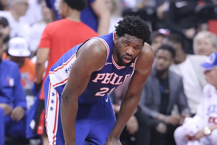 Joel Embiid's body language -- hands on his knees, grimace on his face -- is worth a thousand words.