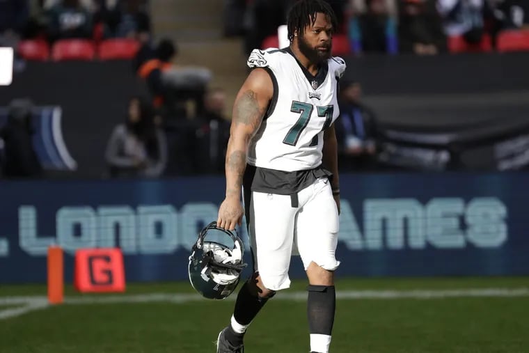 Eagles defensive end Michael Bennett walks on the field before taking on the Jacksonville Jaguars at Wembley Stadium in London on Sunday, October 28, 2018. YONG KIM / Staff Photographer