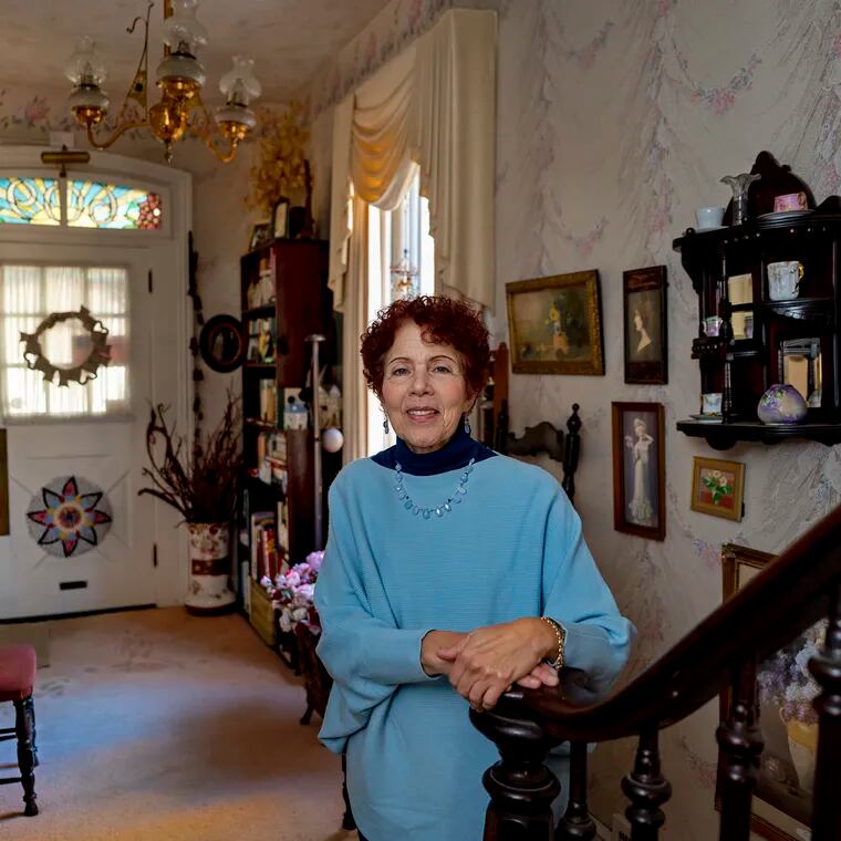 Barbara Kotzin poses in her museum-like Cheltenham home Tuesday, Nov. 14, 2023.  (She has many collections of many other objects, including Victorian skirt lifters of which she is a world expert - she wrote a book on the subject.)  She wants the Mütter Museum to have her skeleton after she dies and has written explicit instructions into her will, but now the museum's new leader says it cannot accept her donation.