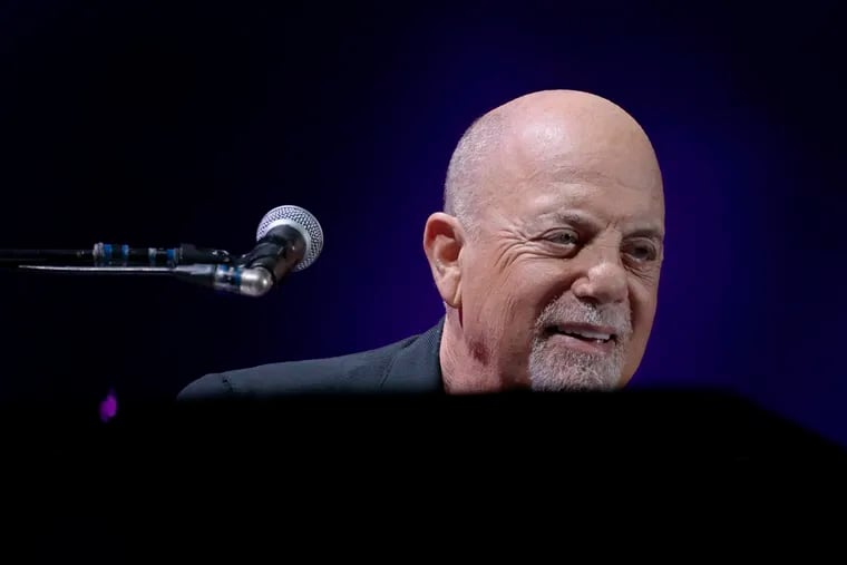 Billy Joel performs during his "Two Icons: One Night" tour at Lincoln Financial Field on Friday. Stevie Nicks is also on the tour.