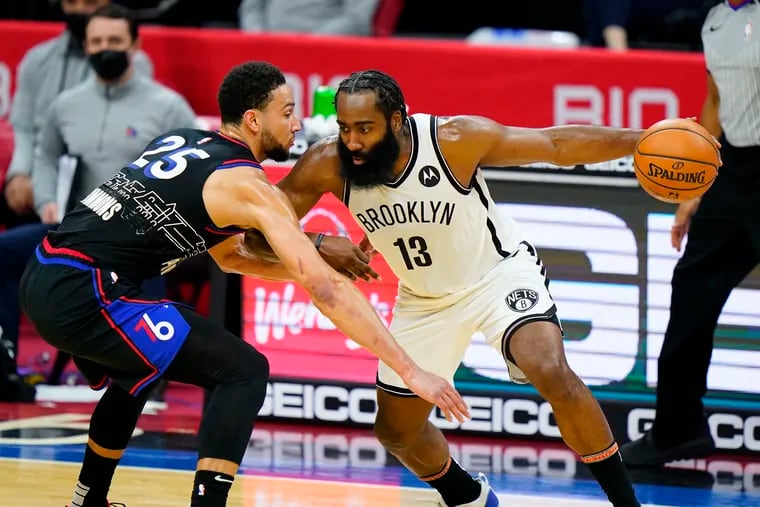 James Harden tries to drive past Ben Simmons during the second half of last Saturday's game.